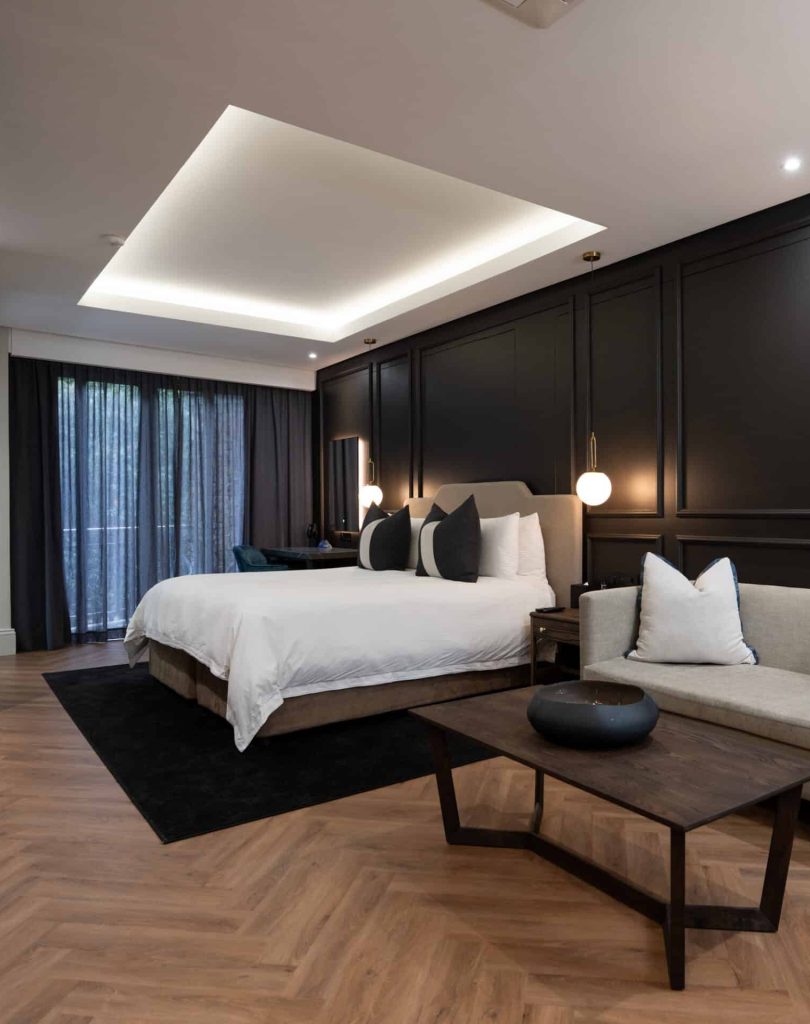 Bedroom in a Grand King Suite at SEVEN